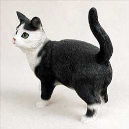 black and white cat figurine